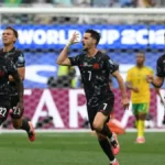 Canadá vence nos acréscimos e é o primeiro classificado às oitavas